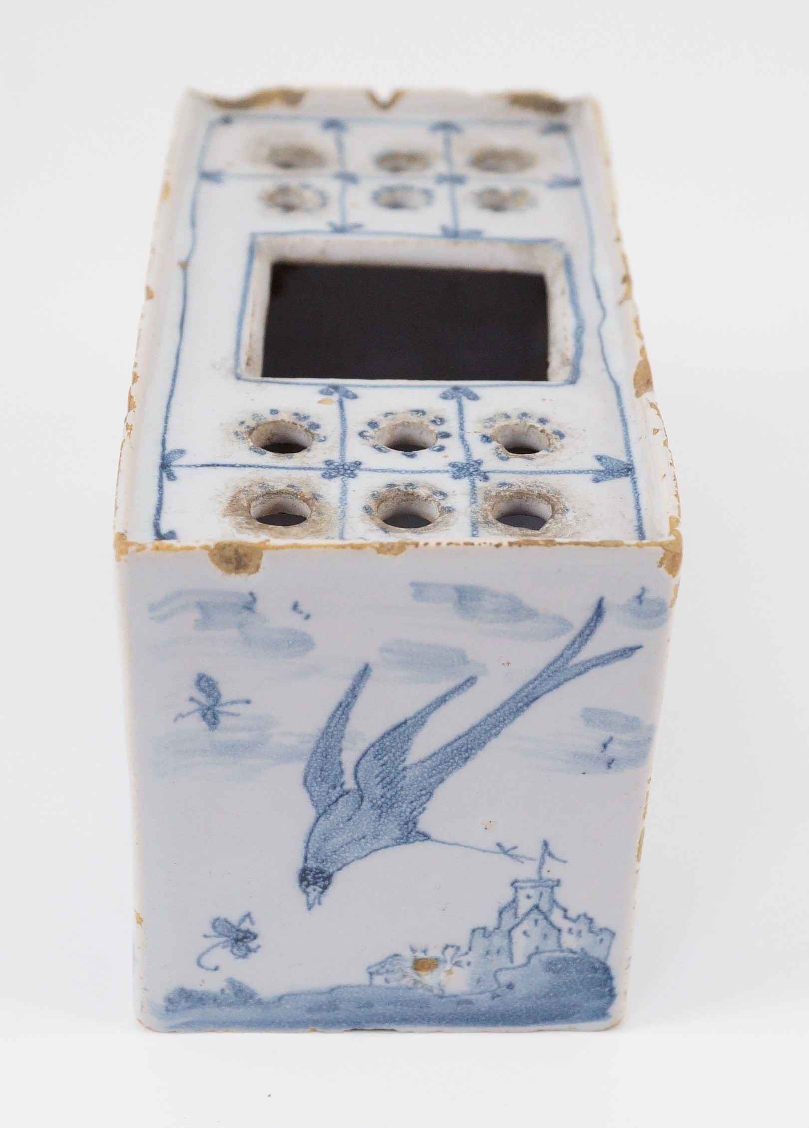 An English delftware flower brick, mid 18th century, 14.5cm wide, chips and crack